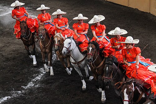 Escaramuza is an equestrian sport performed in side-saddle